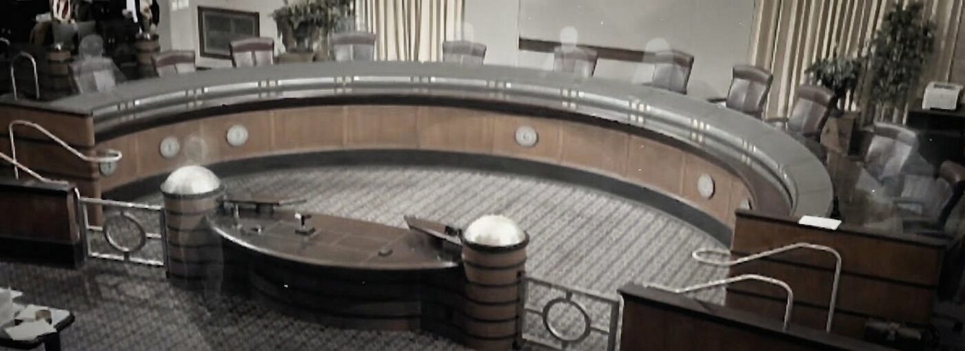 Empty Oakland City Council chambers — Measure NN promised 700 sworn officers; about 500 are on active duty