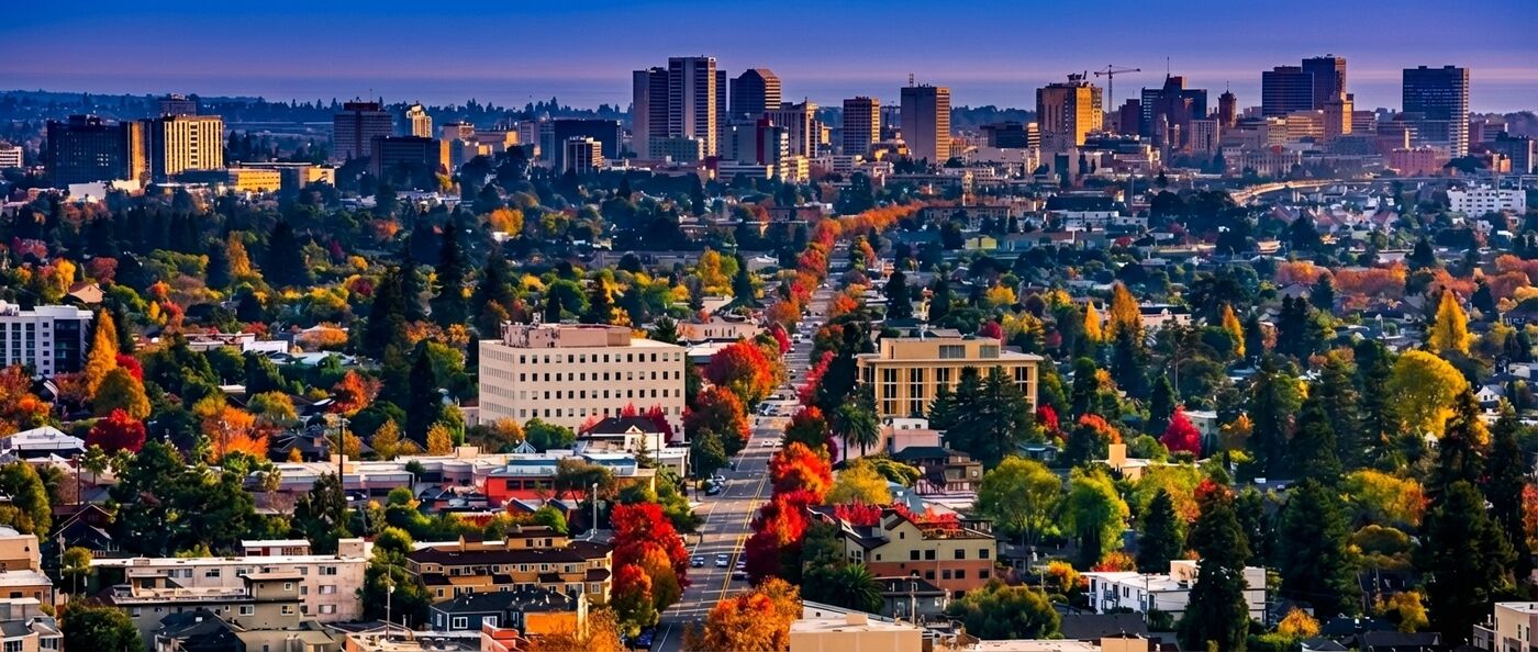 Aerial view of downtown Oakland — a few benefit, everybody pays